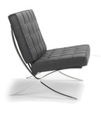 Classic armchair detail in black with chrome detailing